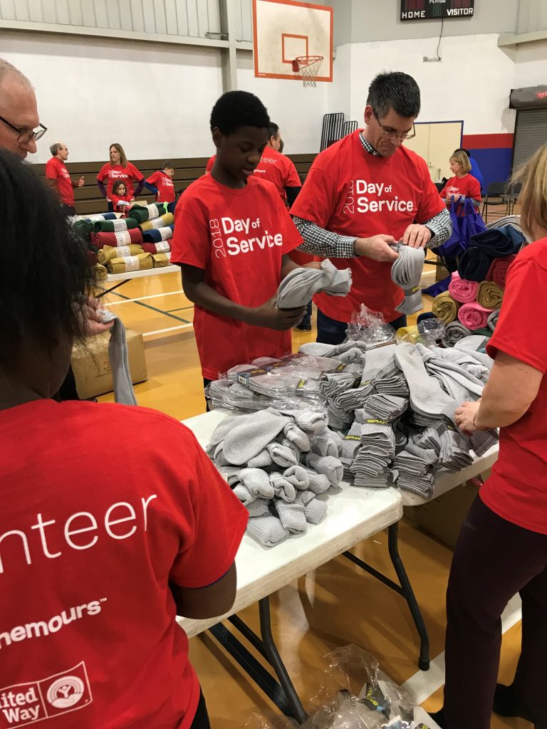 chemours mlk Volunteers with the United Way and Chemours employees organize care packages for the homeless. (Nichelle Polston/WHYY)