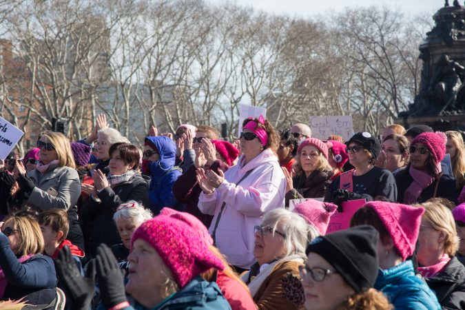 Marchers listen to the speakers at the rally of the 2018 Women's March on Philadelphia, January 20, 2018. (Emily Cohen for WHYY)