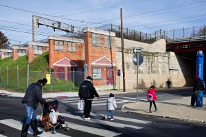 The Norris Homes Historical Marker is an mural created by artist Jenny Schenker on the corner of W Norris St. and N 10th St. and resembles the soon-to-be demolished Norris Apartments, across the street. (Bastiaan Slabbers for WHYY)