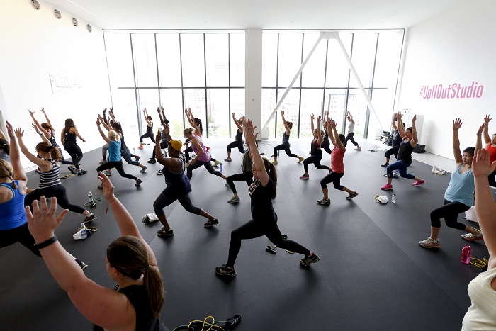 SELF Up & Out Studio IMAGE DISTRIBUTED FOR SELF - Fitness enthusiasts are seen participating in a class at SELF Up & Out Studio on Saturday, June 27, 2015, in New York. (Brian Ach/AP Images for Self)