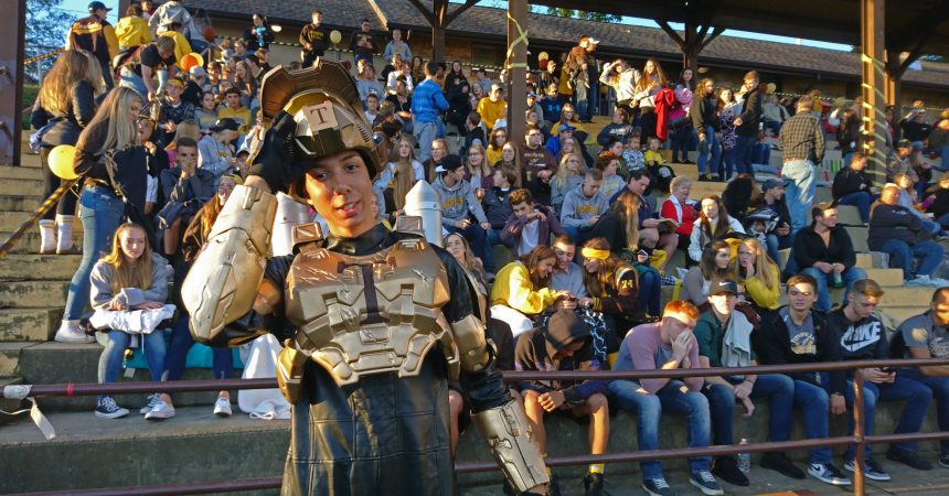Isaac Bowens plays the Titusville 'Rocket Man' mascot during the homecoming football game (Kevin McCorry/Keystone Crossroads)