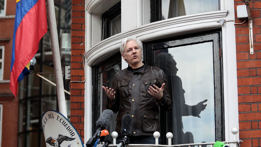 Julian Assange speaks to the media from the balcony of the Embassy of Ecuador on May 19, 2017, in London. (Jack Taylor/Getty Images) 