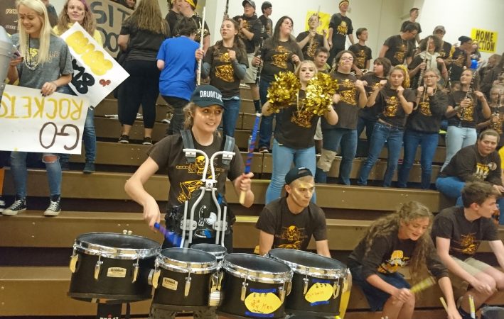 Titusville senior Samantha Pritchard plays in the drumline during the homecoming pep rally.
 (Kevin McCorry/WHYY)
