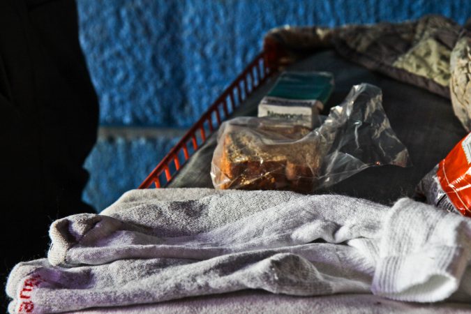 Supplies at a camp under the Frankford bridge in Kensington.