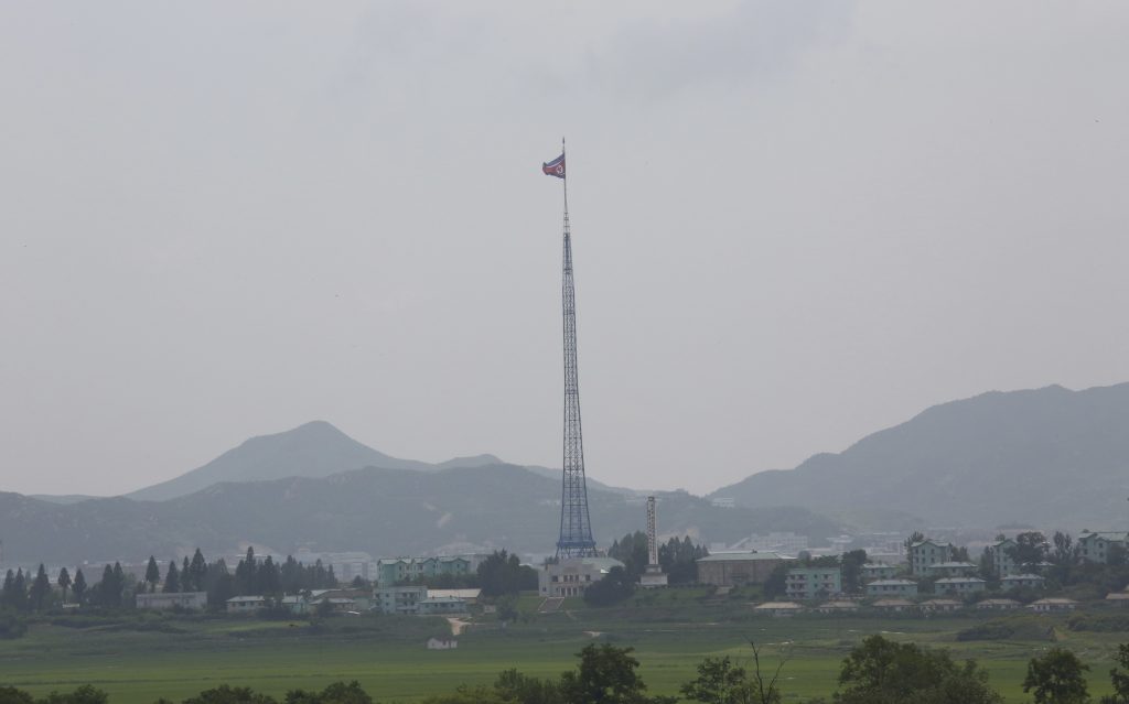 A giant North Korean flag flutters from a 528-foot pole near the border with South Korea. Tunnels built by North Korea’s military are believed to extend across the border. A giant North Korean flag flutters from a 528-foot pole near the border with South Korea. Tunnels built by North Korea's military are believed to extend across the border. (Ahn Young-joon/AP)