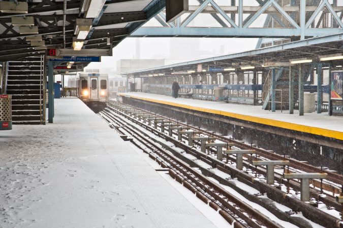 Commuters await the elevated train on the York-Dauphin platform. (Kimberly Paynter/WHYY)