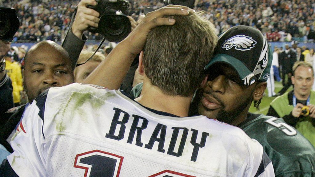 New England Patriots quarterback Tom Brady is congratulated by Philadelphia Eagles quarterback Donovan McNabb after the Patriots won 24-21 in Super Bowl XXXIX at Alltel Stadium on Sunday, Feb. 6, 2005, in Jacksonville, Fla. (AP Photo/Elaine Thompson)