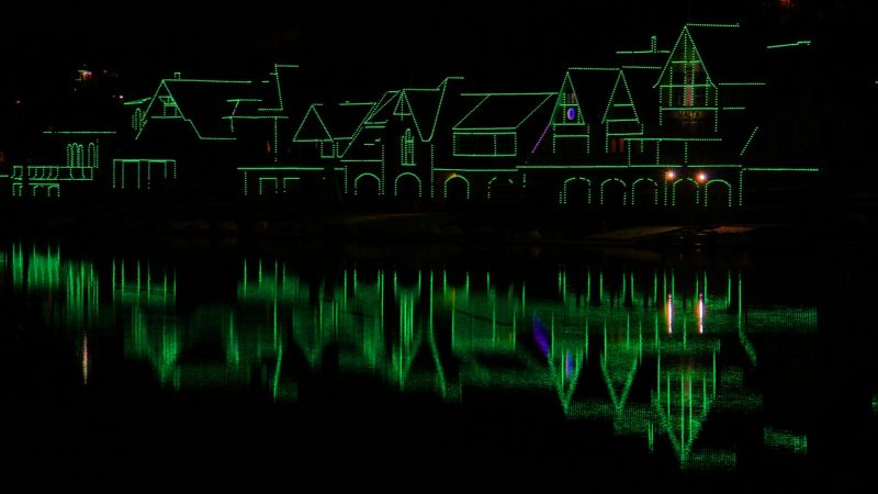Boathouse Row glows green Thursday night in support of the Eagles. (Emma Lee/WHYY)