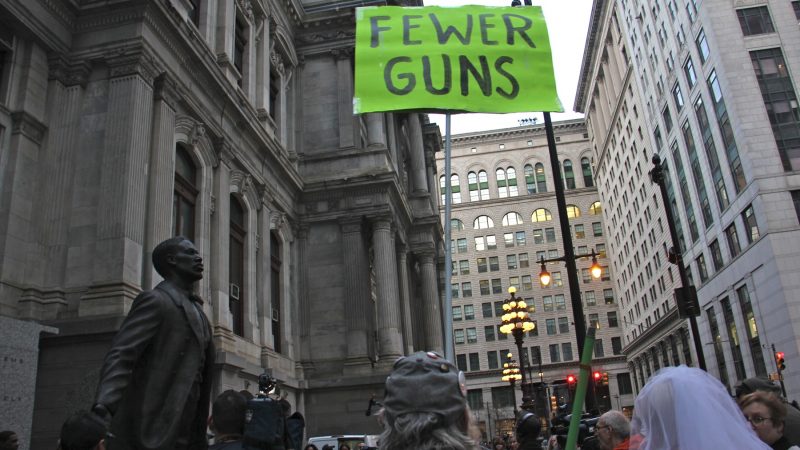 A group of about 50 to remember those killed in the Parkland, Florida, school shooting and to call for gun control legislation. (Emma Lee/WHYY)