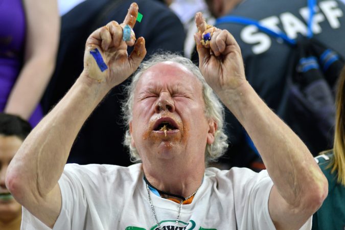 Two days ahead of Super Bowl LII, competitive eaters consume large amounts of wings during the annual Wing Bowl competition, at the Wells Fargo Center, on Friday. (Bastiaan Slabbers for WHYY)
