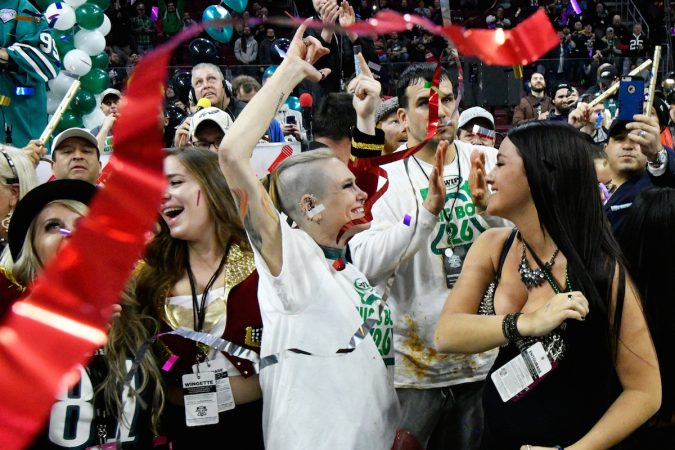 Molly Schuyler wins the event by consuming the record-breaking amount of 501 wings, during Wing Bowl 26, at the Wells Fargo Center, on Friday. (Bastiaan Slabbers for WHYY)