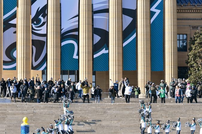 Eagles team members walk down the Art Museum steps in front of hundreds of thousands at the Parkway in Philadelphia, PA, on February 8, 2018, to celebrate the Philadelphia Eagles winning Super Bowl LII. The Eagles beat the New England Patriots by 41-33. (Bastiaan Slabbers for WHYY)