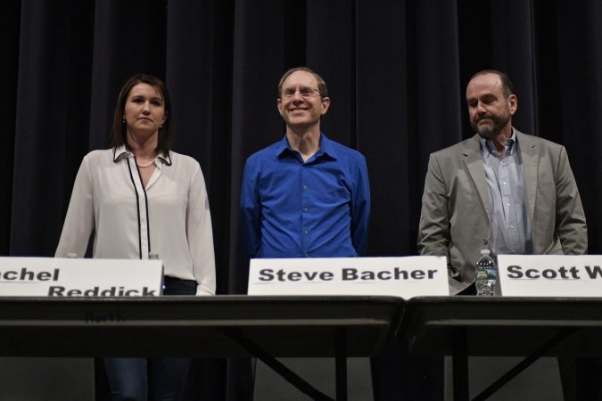 Rachel Reddick, Steve Bacher, and Scott Wallace, candidates for the Democratic nomination in the newly-drawn 1st Congressional District, attend a candidate forum in Newtown, Pa. on Tuesday evening. (Bastiaan Slabbers/for WHYY)