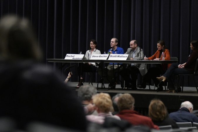 Rachel Reddick, Steve Bacher, and Scott Wallace, candidates for the Democratic nomination in the newly-drawn 1st Congressional District, attend a candidate forum in Newtown, Pa. on Tuesday evening. (Bastiaan Slabbers/for WHYY)