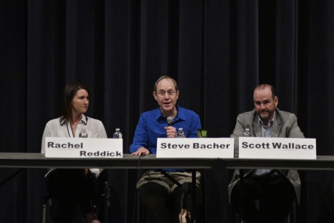 Rachel Reddick, Steve Bacher, and Scott Wallace, candidates for the Democratic nomination in the newly-drawn 1st Congressional District, attend a candidate forum in Newtown, Pa. on Tuesday evening. (Bastiaan Slabbers/for WHYY)