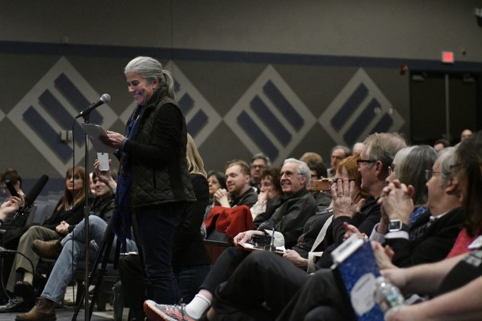Audience members react as candidates from the Democratic Party speak at a candidate forum at Council Rock High School North Auditorium Newtown, Pa. on Tuesday evening. (Bastiaan Slabbers/for WHYY)