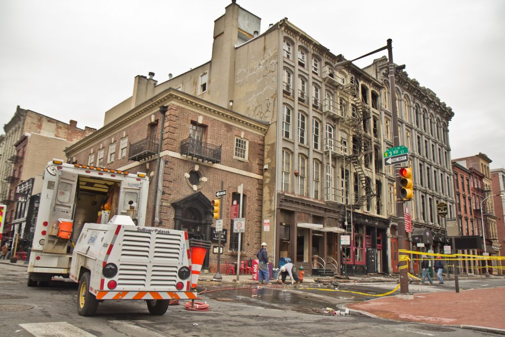 The area 4-alarm fire at 239 Chestnut Street which was contained around 7:30 a.m. this morning is closed off and being evaluated for further risk.