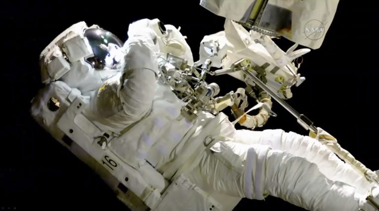 In this image from video made available by NASA, astronaut Joe Acaba performs a spacewalk outside the International Space Station on Friday, Oct. 20, 2017. (NASA via AP)