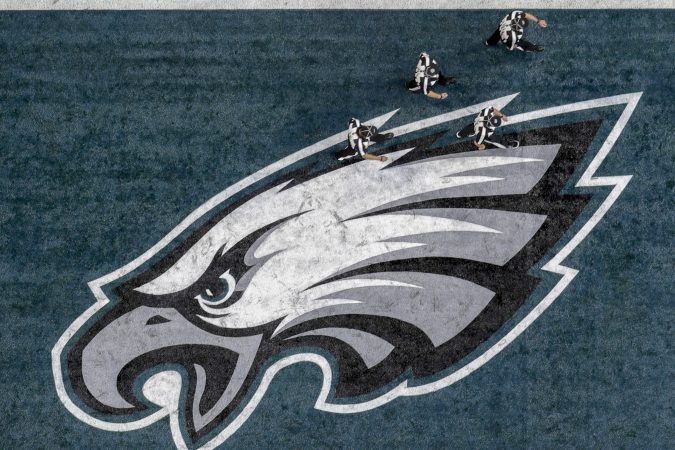 Officials walk on the field before the NFL Super Bowl 52 football game between the Philadelphia Eagles and the New England Patriots, Sunday, Feb. 4, 2018, in Minneapolis.