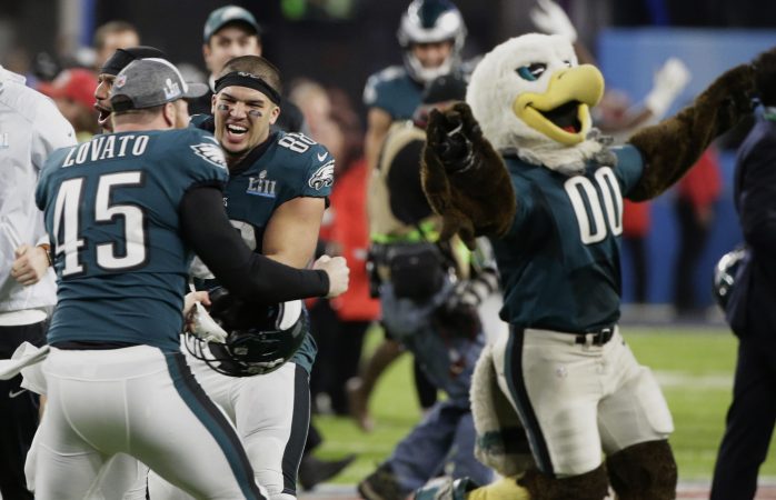 Philadelphia Eagles long snapper Rick Lovato (45) and tight end Trey Burton (88) celebrate after winning the NFL Super Bowl 52 football game against the New England Patriots Sunday, Feb. 4, 2018, in Minneapolis. The Eagles won 41-33. (AP Photo/Frank Franklin II)