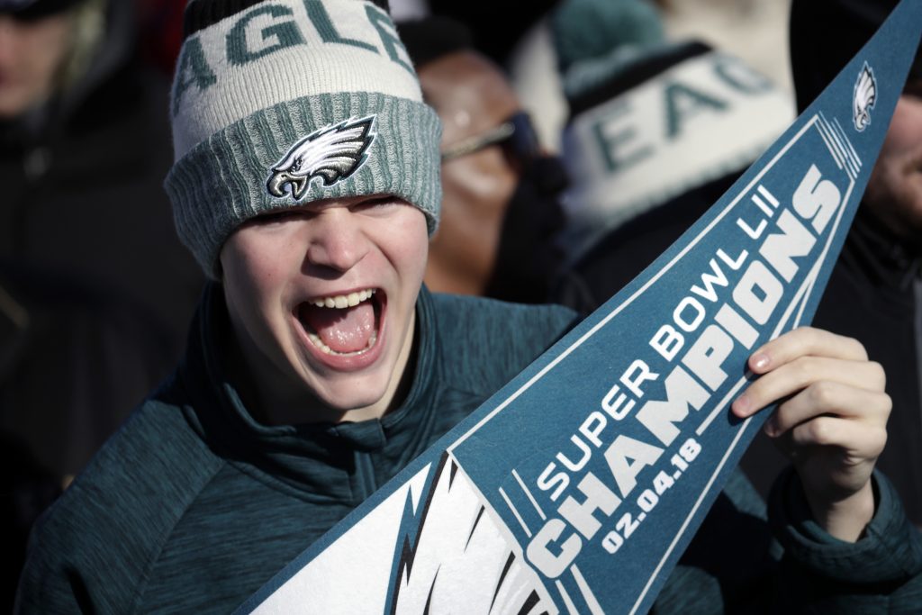 Eagles Super Bowl Football A Philadelphia Eagles fan chants while waiting for the team to arrive in Philadelphia at Philadelphia International Airport a day after defeating the New England Patriots in Super Bowl 52 in Minneapolis, Monday, Feb. 5, 2018. (AP Photo/Julio Cortez)