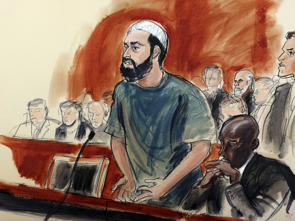 Ahmad Khan Rahimi In this courtroom drawing, defendant Ahmad Khan Rahimi reads a statement to the judge during his sentencing hearing in New York, Tuesday, Feb. 13, 2018. Rahimi was sentenced to multiple terms of life in prison for setting off small bombs in two states, including a pressure cooker device that blasted shrapnel across a New York City block. At right is attorney Xavier Donaldson, Rahmin's attorney. (Elizabeth Williams via AP)