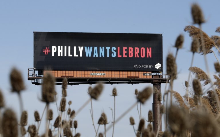One of three billboards trying to entice Cleveland Cavaliers' LeBron James to come to Philadelphia are shown near a highway, Tuesday, Feb. 27, 2018, in Cleveland.  (Tony Dejak/AP Photo)