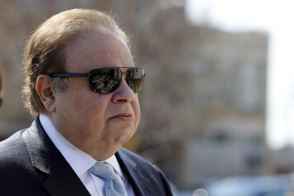 Salomon Melgen In this April 2, 2015, file photo, Dr. Salomon Melgen arrives at the Martin Luther King Jr. Federal Courthouse for his arraignment, in Newark, N.J. (Julio Cortez/AP Photo, File)