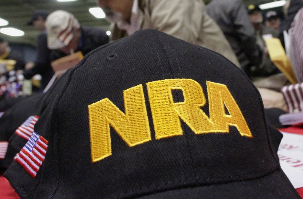 School Shooting NRA Grant In this March 7, 2012 file photo, Illinois gun owners and supporters file out National Rifle Association applications while participating in an Illinois Gun Owners Lobby Day convention before marching to the Illinois state Capitol in Springfield, Ill. The troubled teen authorities say killed several people at a Florida high school on Wednesday, Feb. 14, 2018, excelled in an air-rifle marksmanship program supported by a grant from the National Rifle Association Foundation, part of a multimillion-dollar effort by the gun group to support youth shooting clubs. (Seth Perlman/AP Photo, file)