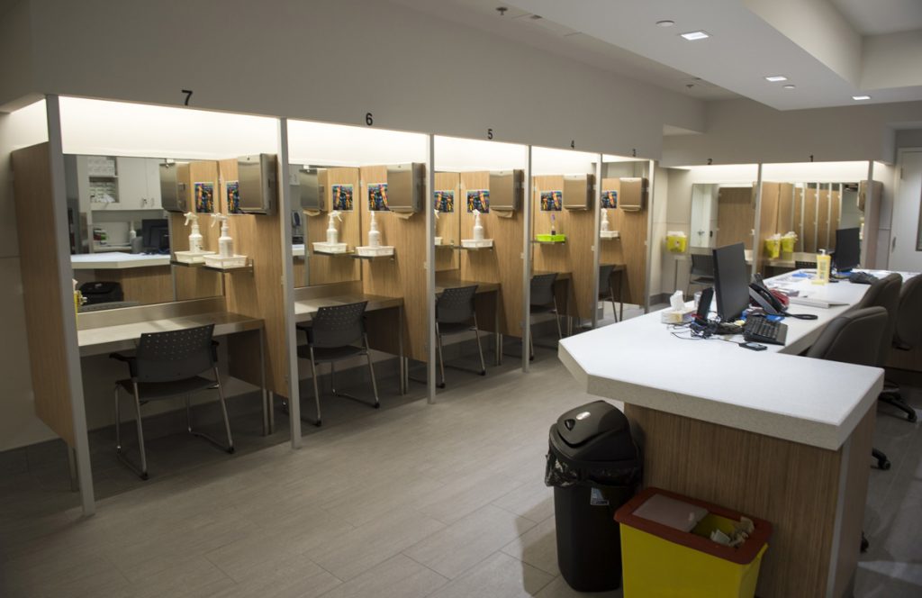 Canada Opioid Oasis Booths line the Cactus safe-injection site where drug addicts can shoot up using clean needles, get medical supervision, and freedom from arrest in Montreal. (Paul Chiasson/The Canadian Press via AP)