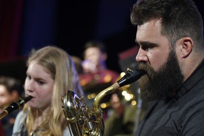 Kelce joins the jazz band of his alma mater, Cleveland Heights High School, on stage during an exchange program visit at Central High School, in Philadelphia, Pa., on February 22, 2018. (Bastiaan Slabbers/for WHYY)