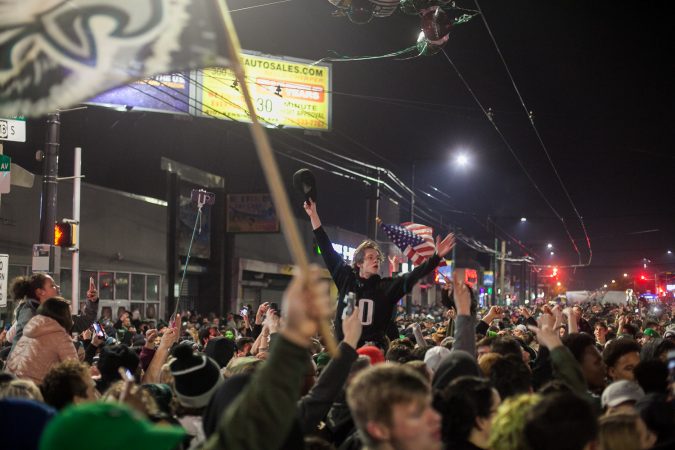 Fans in Northeast Philadelphia flooded Frankford and Cottman Avenue after the Eagles 41-33 win over the New England Patriots to become the 2018 Super Bowl Champions Sunday night. (Brad Larrison for WHYY)