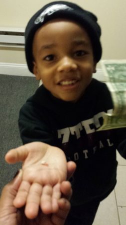 The Eagles may have won the Super Bowl, but a tooth was lost at the Nuri household. (Trenae Nur/WHYY) 