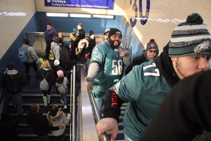 Happy Eagles fans arrive at 30th Street station on the Market Frankford line.