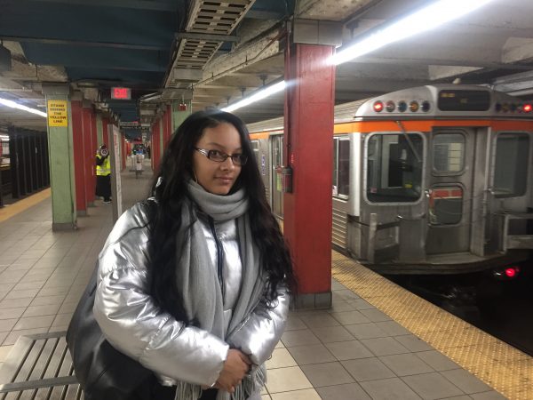 Destiny Daye, 20, of North Philly, is waiting for the Broad Street Line to get to her job at Penn. Normally she’d transfer to the El at City Hall, but that’s closed today. “I’m happy the Eagles won, she says, “but this is frustrating.” Her plan? Walk.