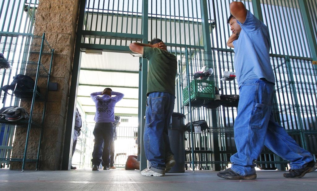 Immigrants, suspected of being in the U.S. illegally, are transferred to be processed at the Tucson Sector of the U.S. Customs and Border Protection headquarters in Arizona in 2016. Immigrants, suspected of being in the U.S. illegally, are transferred to be processed at the Tucson Sector of the U.S. Customs and Border Protection headquarters in Arizona in 2016. (Ross D. Franklin/AP)