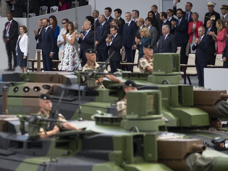 Tanks parade past President Trump, first lady Melania Trump, French President Emmanuel Macron and his wife Brigitte Macron, during a Bastille Day parade on the Champs Elysees avenue in Paris, on July 14.