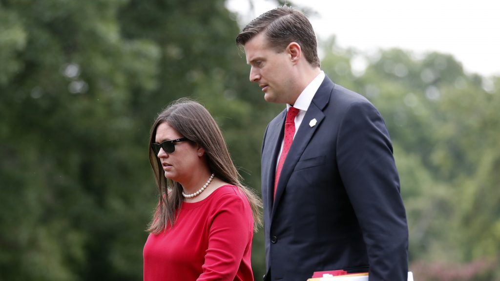 White House press secretary Sarah Sanders with former staff secretary Rob Porter in August. In the wake of Porter’s resignation, Sanders has reassured reporters that President Trump is sympathetic to victims of domestic abuse. White House press secretary Sarah Sanders with former staff secretary Rob Porter in August.
