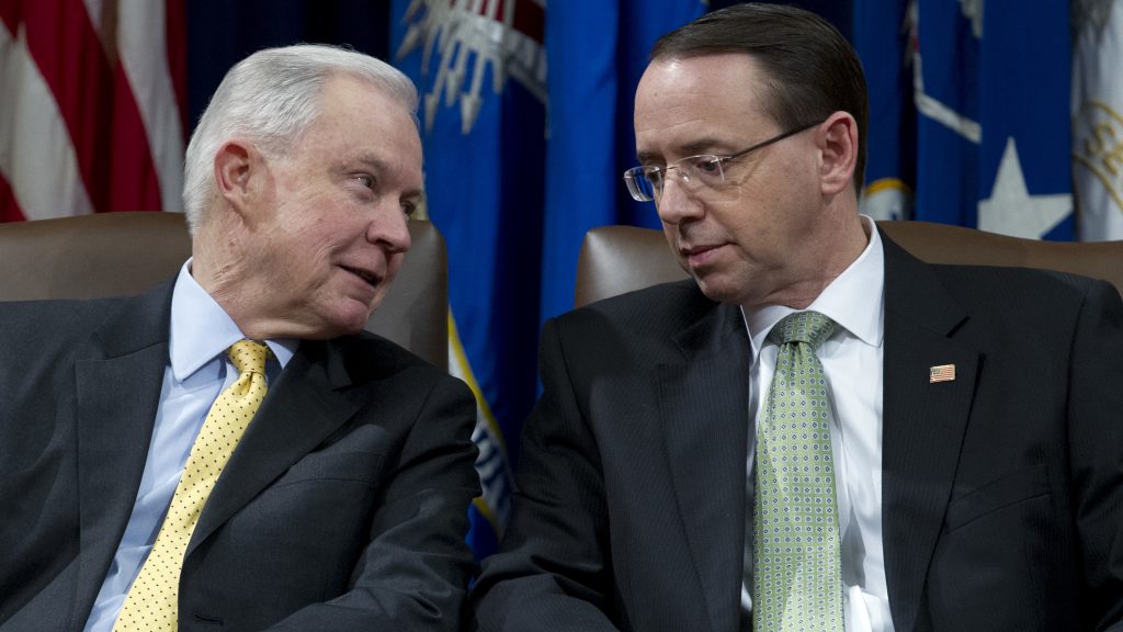 Attorney General Jeff Sessions speaks with Deputy Attorney General Rod Rosenstein at an event at the Department of Justice in Washington, D.C. on Feb. 2, 2018. Attorney General Jeff Sessions speaks with Deputy Attorney General Rod Rosenstein at an event at the Department of Justice in Washington, D.C. on Feb. 2, 2018. (Jose Luis Mag/AP)