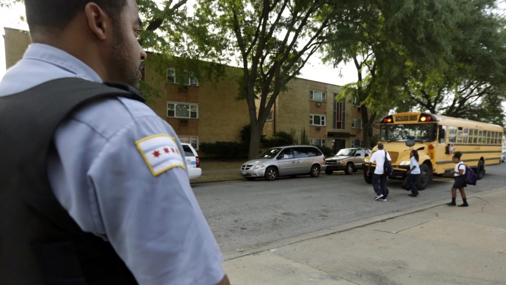 Many administrators are taking steps to secure their schools, including by hiring security guards and police officers. (M. Spencer Green/AP)