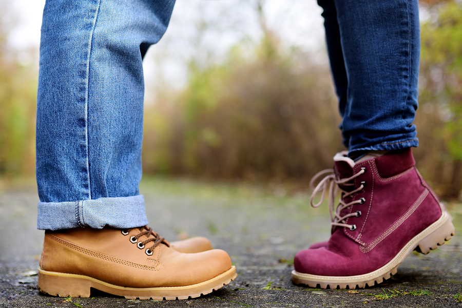 dating Closeup photo of male and female legs during a date in autumn park. Love couple romantic concept
