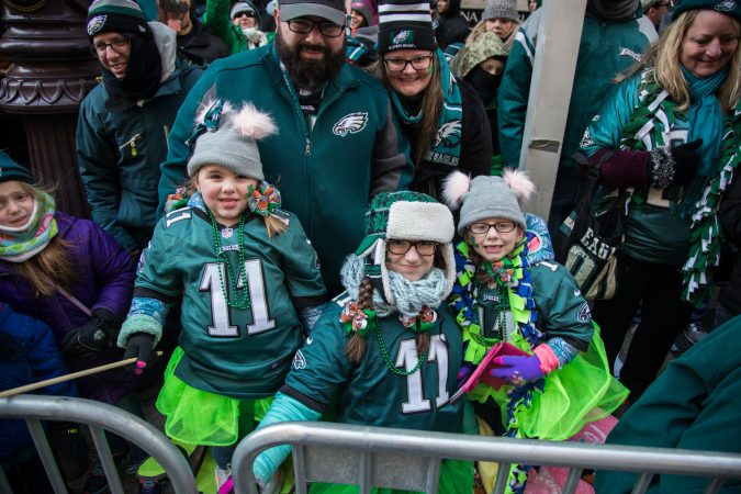 The Santora family stayed warm and festive as they waited to cheer on their winning Eagles for the Super Bowl Champions parade in Philadelphia February 8th 2018. (Emily Cohen for WHYY)
