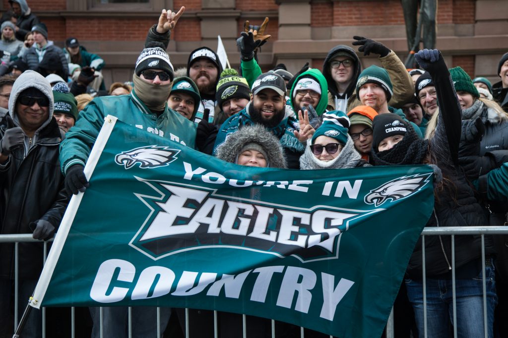 cohen-eagles_parade-13 Friends from North Philadelphia faced the cold since 5:30 a.m. to get the best spot they could for the Eagles Super Bowl Champions parade in Philadelphia February 8th 2018. (Emily Cohen for WHYY)