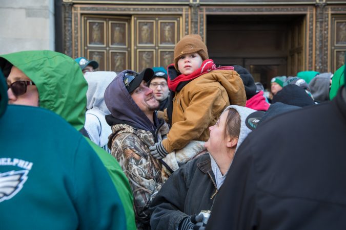 Fans young and old faced the freezing temperatures to cheer on their winning Eagles for the Super Bowl Champions parade in Philadelphia February 8th 2018. (Emily Cohen for WHYY)