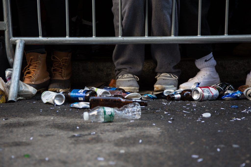 cohen-eagles_parade-7 A close-up of trash on the sidewalk.