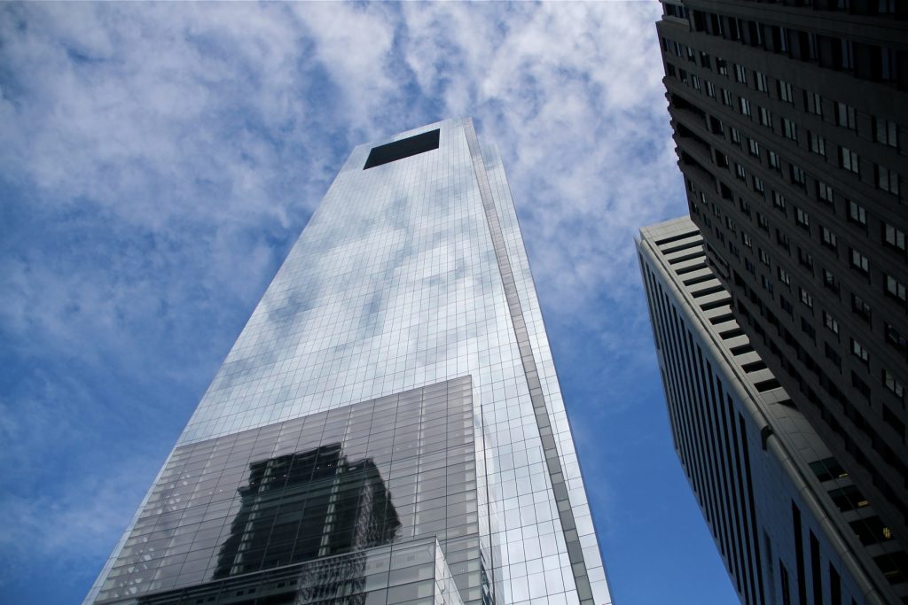 comcast tower The Comcast tower in Philadelphia reflects clouds and blue sky.
