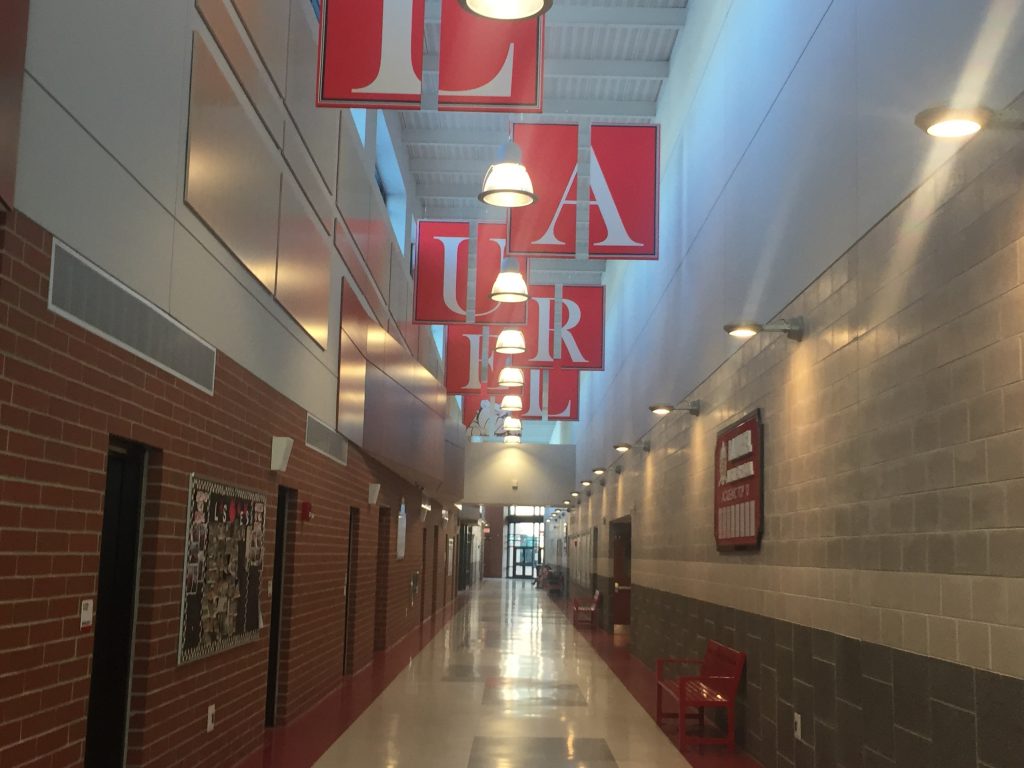 Laurel Middle School Laurel Middle School, which shares space with the high school in a sprawling building that opened during the 2014-15 school year, has improved dramatically since being declared a Priority school and threatened with possible closure. (Cris Barrish/WHYY)