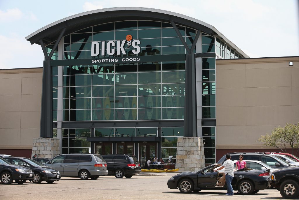 Customers shop at a Dick’s Sporting Goods store in Niles, Ill., in 2014. The sports retailer CEO Ed Stack announced Dick’s is immediately ending its sales of assault-style rifles and requiring all customers to be older than 21 to buy a firearm at its stores. Customers shop at a Dick's Sporting Goods store in Niles, Ill., in 2014. The sports retailer CEO Ed Stack announced Dick's is immediately ending its sales of assault-style rifles and requiring all customers to be older than 21 to buy a firearm at its sto