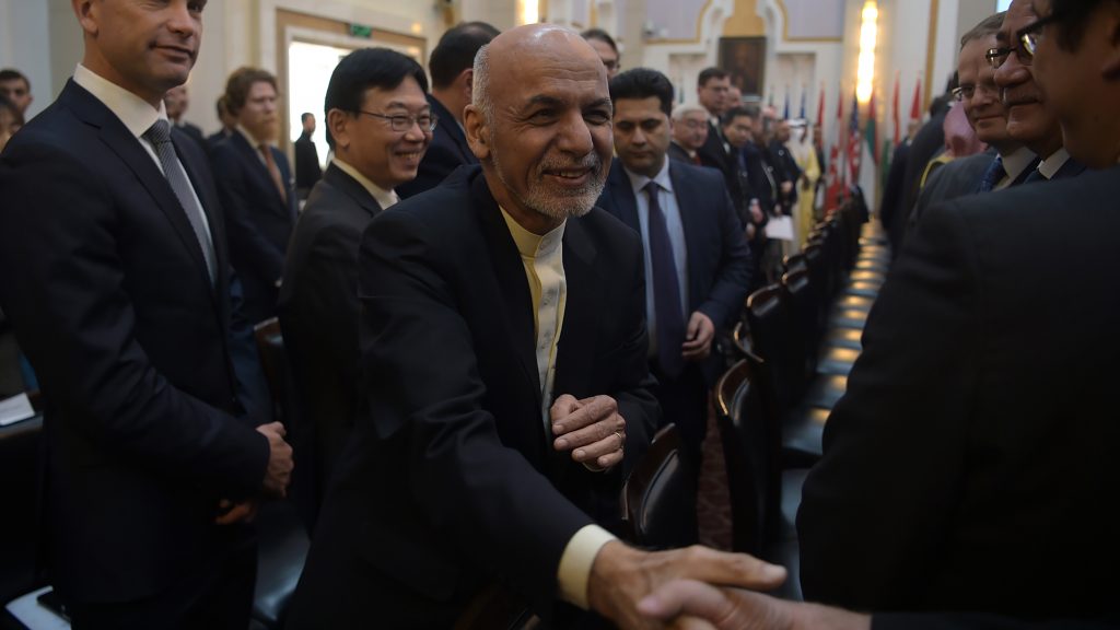Afghan President Ashraf Ghani shakes hands with a foreign delegate at the Kabul Process conference in the country’s capital Wednesday. During the conference, Ghani called on the Taliban to participate in peace talks with the Afghan government. Afghan President Ashraf Ghani shakes hands with a foreign delegate at the Kabul Process conference in the country's capital Wednesday. During the conference, Ghani called on the Taliban to participate in peace talks with the Afghan government. (Shah Marai/AFP/Getty Images)
