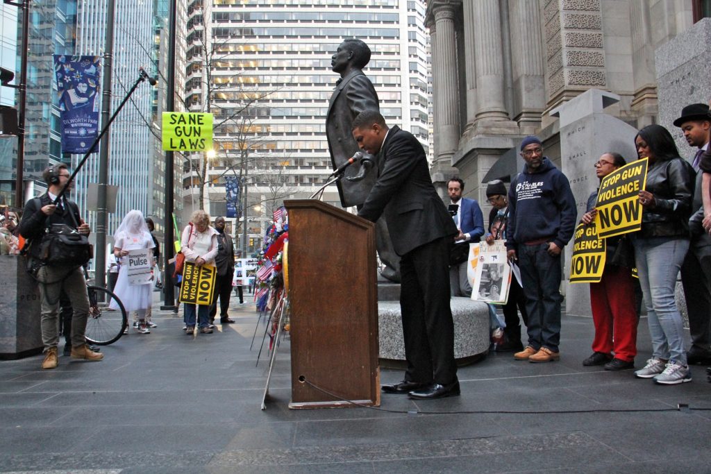 lead2018 02 20-e lee-nicolas orourke-philadelphia city hall-shooting victims vigil The Rev. Nicolas O'Rourke, of the Living Water United Church of Christ in Northeast Philadelphia, says a prayer for the victims of gun violence during a vigil for the Parkland, Florida, school shooting victims.